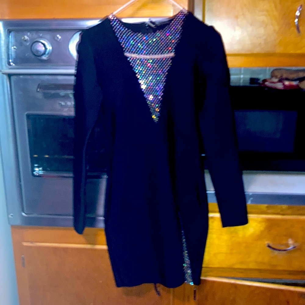 Bella Barnett little black dress size sm. With jeweled mesh bust line and side.